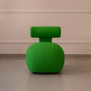 Fauteuil en tissu bouclette vert